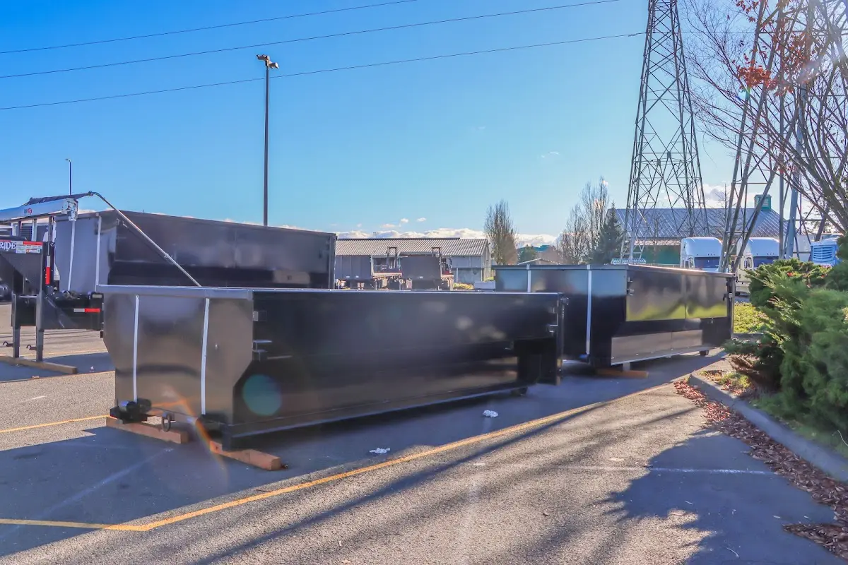 Roll-off dumpster ready for waste disposal at job site for 2 Yard Dumpster Rental in Shelley
